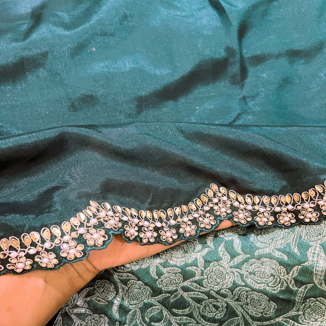 Forest Green Silk Saree with intricate cutwork Lace.