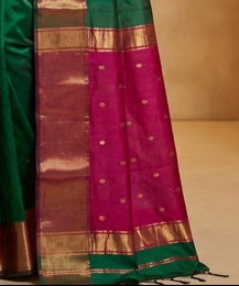 Manmohini (Green Maheswari Silk Saree with pink pallu)
