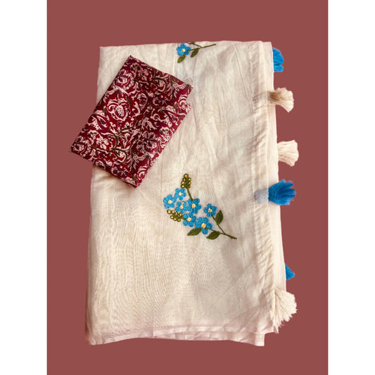 Beige Saree in Tussar blend and Ajrakh print blouse.