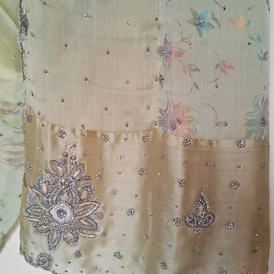 Pista Green colored, Satin Crepe Floral Print Sequined Saree